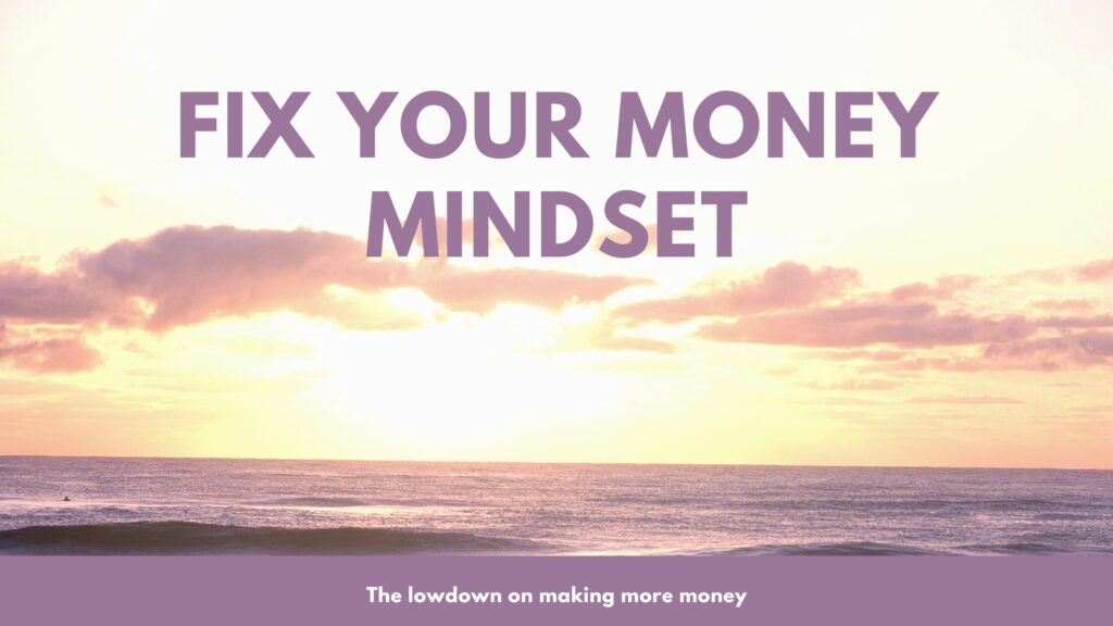 a pastel sunset with fix your money mindset floating on top